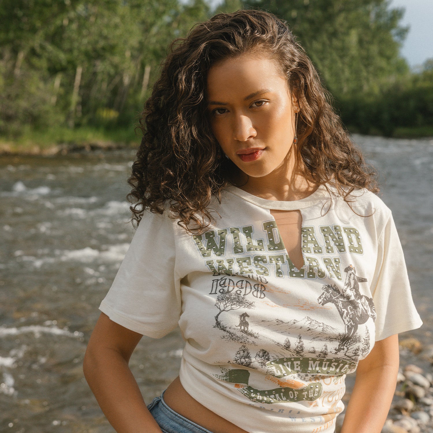Girl by a river